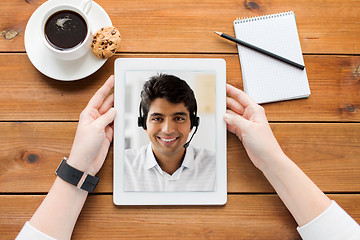 Image showing close up of woman having video call on tablet pc