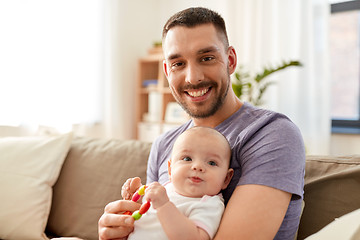 Image showing happy father with little baby daughter at home