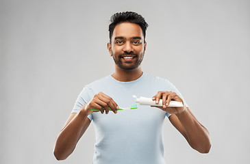 Image showing indian man with toothbrush and toothpaste