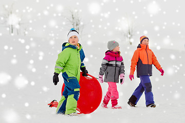 Image showing happy little kids with outdoors in winter