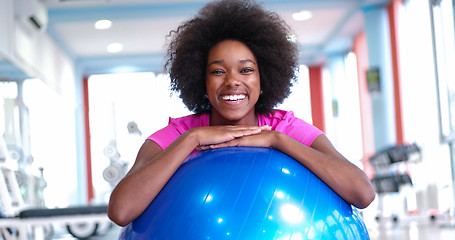 Image showing portrait of young afro american woman in gym on workout break