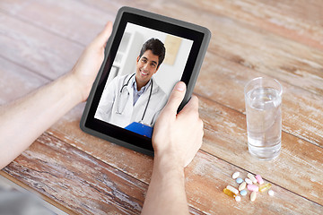 Image showing patient having video chat with doctor on tablet pc