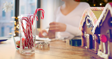 Image showing close up of candy canes and gingerbread houses