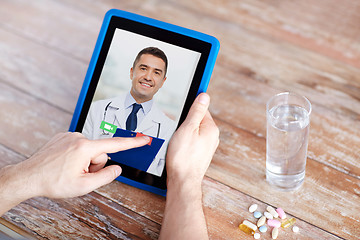 Image showing patient having video chat with doctor on tablet pc