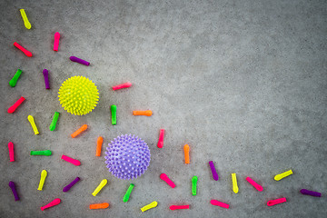 Image showing Colorful balloons and rubber balls on concrete background