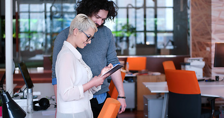 Image showing Business People Working With Tablet in office