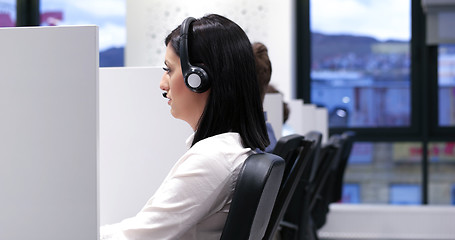 Image showing female call centre operator doing her job