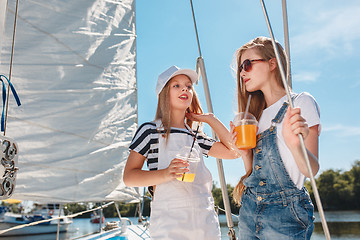 Image showing The children on board of sea yacht