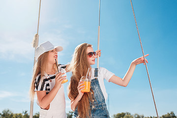 Image showing The children on board of sea yacht