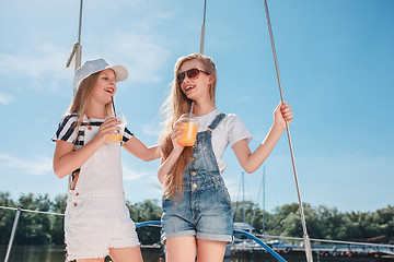 Image showing The children on board of sea yacht