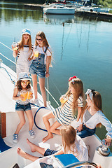 Image showing The children on board of sea yacht