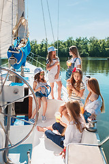 Image showing The children on board of sea yacht