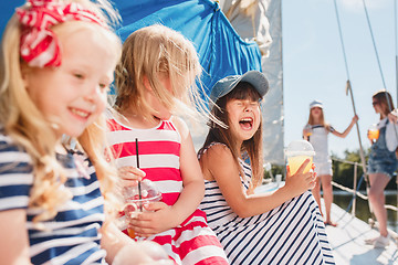 Image showing The children on board of sea yacht