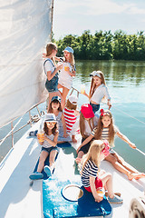 Image showing The children on board of sea yacht