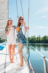 Image showing The children on board of sea yacht