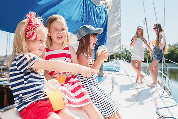 Image showing The children on board of sea yacht