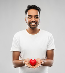 Image showing smiling indian man with red heart over grey