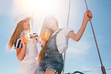 Image showing The children on board of sea yacht