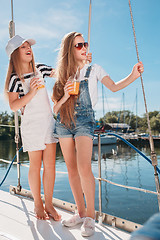 Image showing The children on board of sea yacht