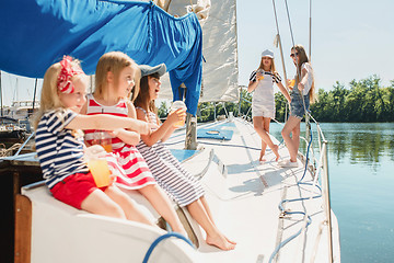 Image showing The children on board of sea yacht