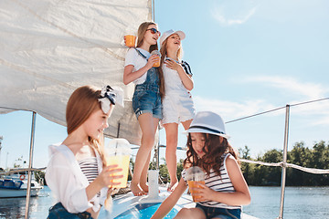 Image showing The children on board of sea yacht