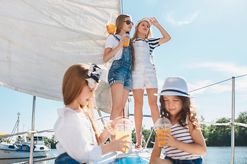 Image showing The children on board of sea yacht