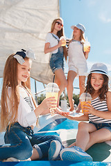 Image showing The children on board of sea yacht