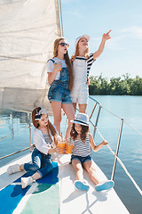 Image showing The children on board of sea yacht