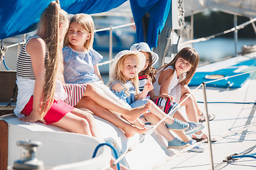 Image showing The children on board of sea yacht