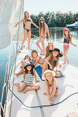 Image showing The children on board of sea yacht