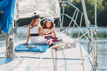 Image showing The children on board of sea yacht