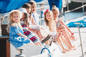 Image showing The children on board of sea yacht