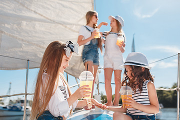 Image showing The children on board of sea yacht