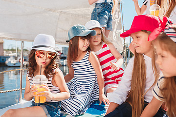 Image showing The children on board of sea yacht