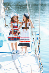 Image showing The children on board of sea yacht