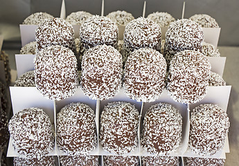 Image showing Chocolate candy with coconut in a street market