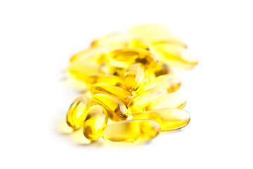 Image showing Omega-3 oil capsules and vitamin for health care isolated on whi
