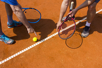 Image showing Tennis players shows the track on the tennis court