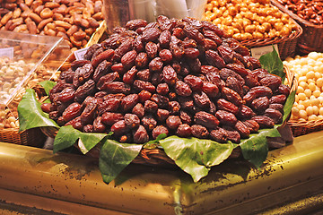 Image showing Bunch of dried dates for sale in market