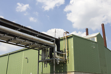 Image showing Metal tubes for mechanical ventilation system on an industrial p