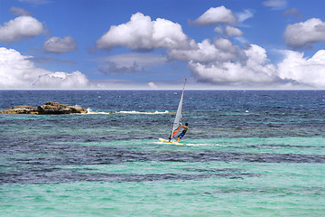Image showing Windsurfing on sea and blue sky background