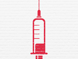 Image showing Healthcare concept: Syringe on wall background