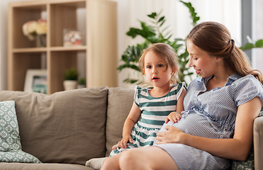 Image showing pregnant mother and daughter at home