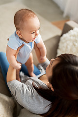 Image showing happy mother with little baby son at home