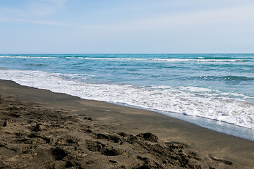 Image showing Beautiful sea and the black sandy beach,