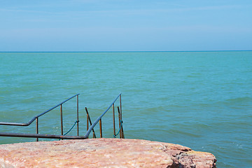 Image showing Beautiful azure sea and the rocky beach