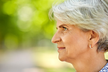 Image showing portrait of senior woman at summer park