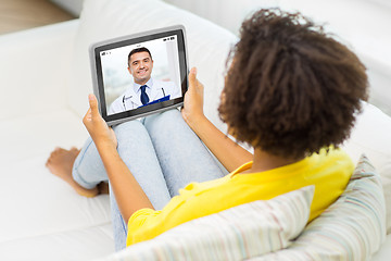 Image showing patient having video chat with doctor on tablet pc