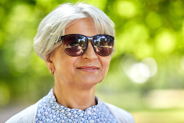 Image showing portrait of happy senior woman at summer park