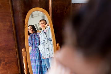 Image showing women choosing clothes at vintage clothing store